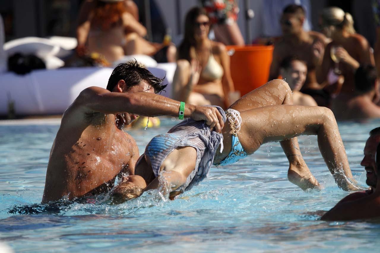 16P Katie Price Jordan looking sexy in bikini with boyfriend in pool paparazzi pictu