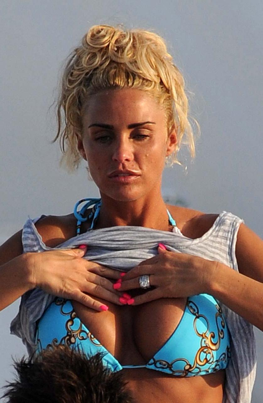 16P Katie Price Jordan looking sexy in bikini with boyfriend in pool paparazzi pictu