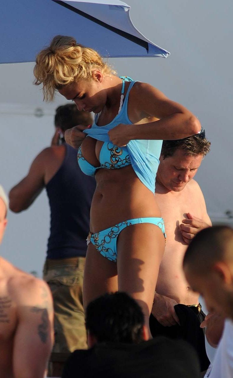 16P Katie Price Jordan looking sexy in bikini with boyfriend in pool paparazzi pictu