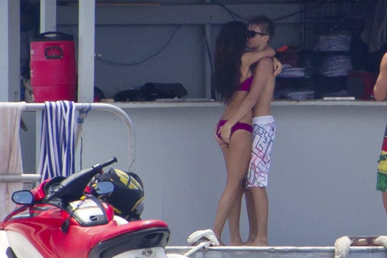 16P Selena Gomez exposing her sexy body and hot ass in bikini on beach