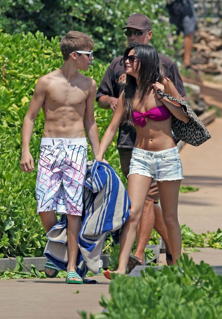 16P Selena Gomez exposing sexy body in bikini while walking with her boyfriend