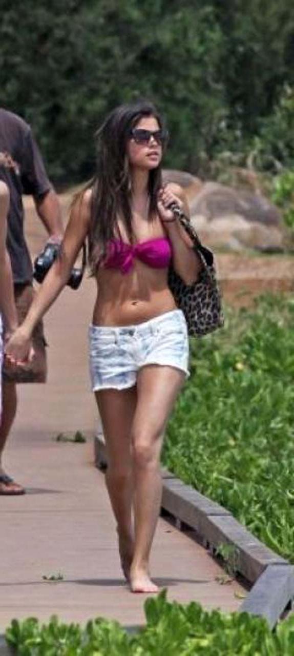 16P Selena Gomez exposing sexy body in bikini while walking with her boyfriend