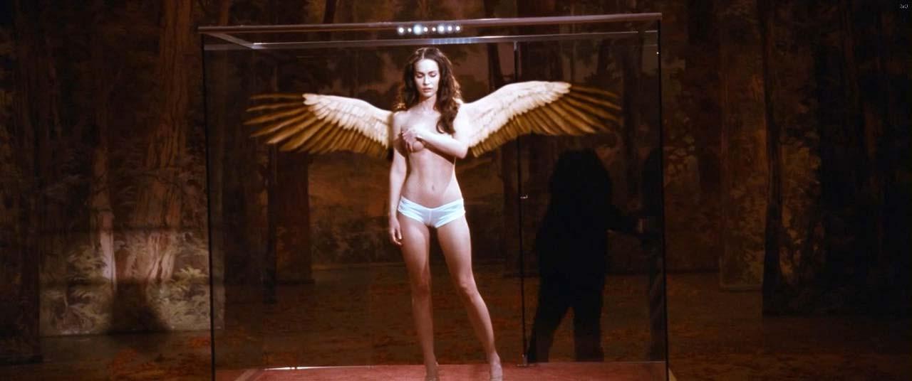 16P Megan Fox posing topless as angel and showing sexy body in bikini on beach