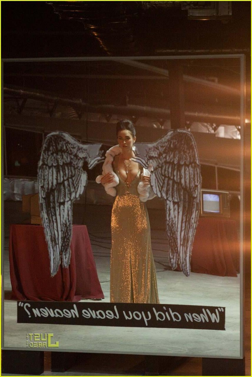 16P Megan Fox posing topless as angel and showing sexy body in bikini on beach
