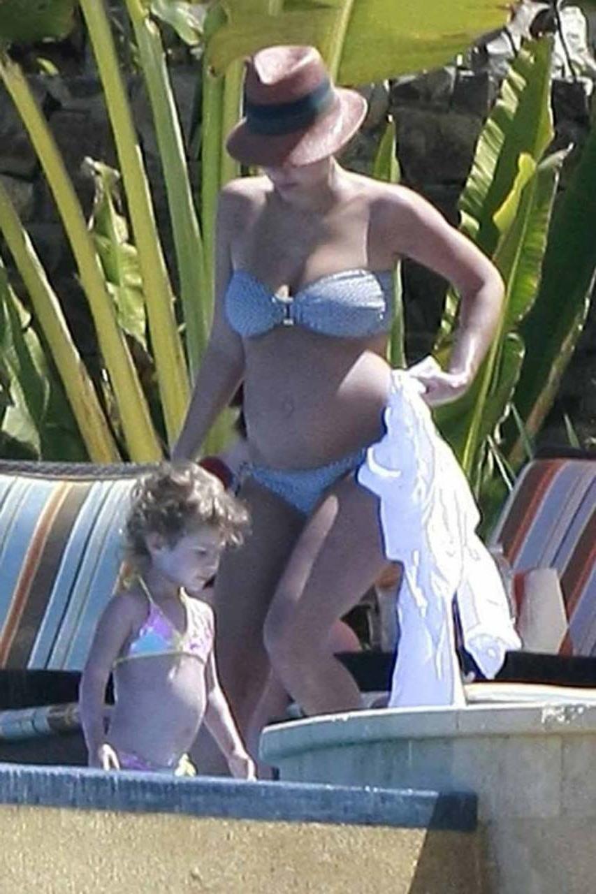 16P Jessica Alba exposing her sexy body and huge boobs in bikini on pool