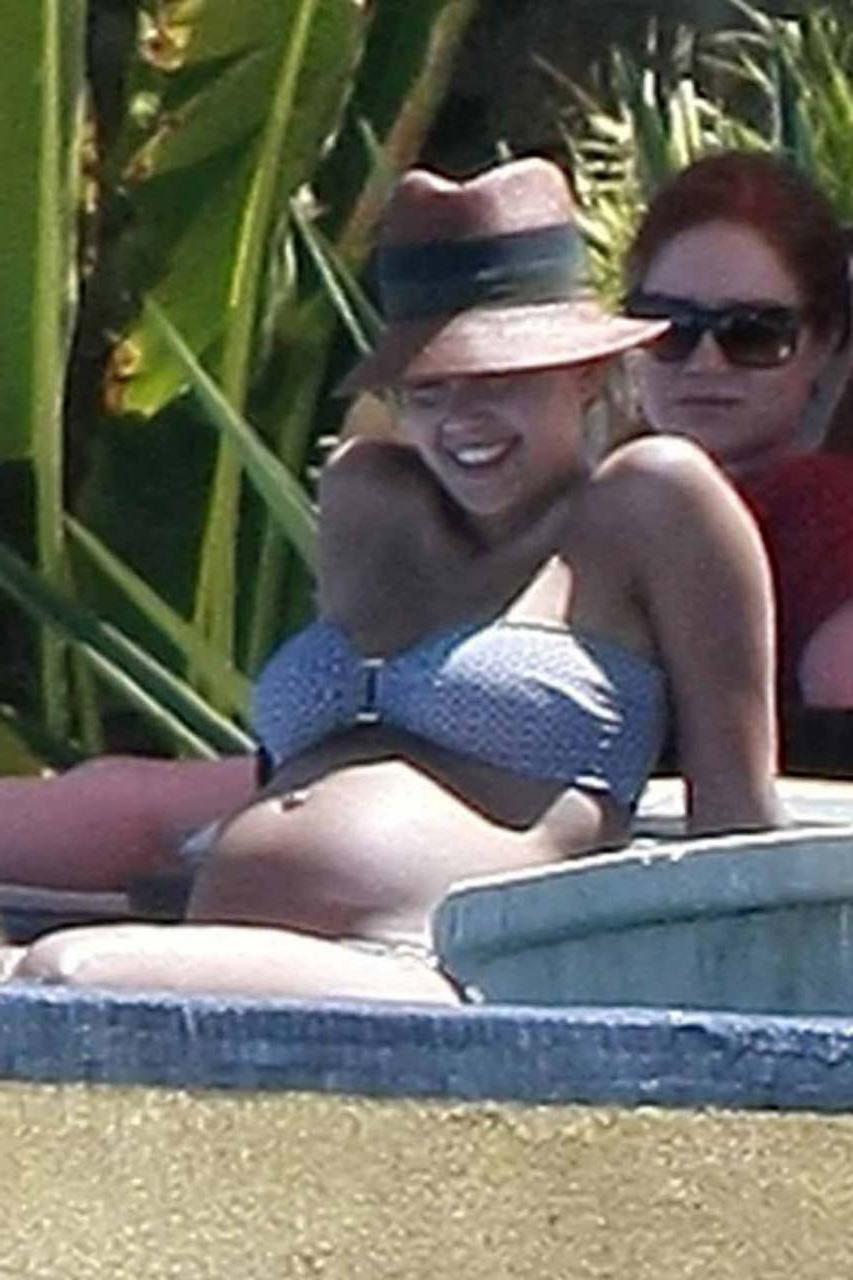 16P Jessica Alba exposing her sexy body and huge boobs in bikini on pool