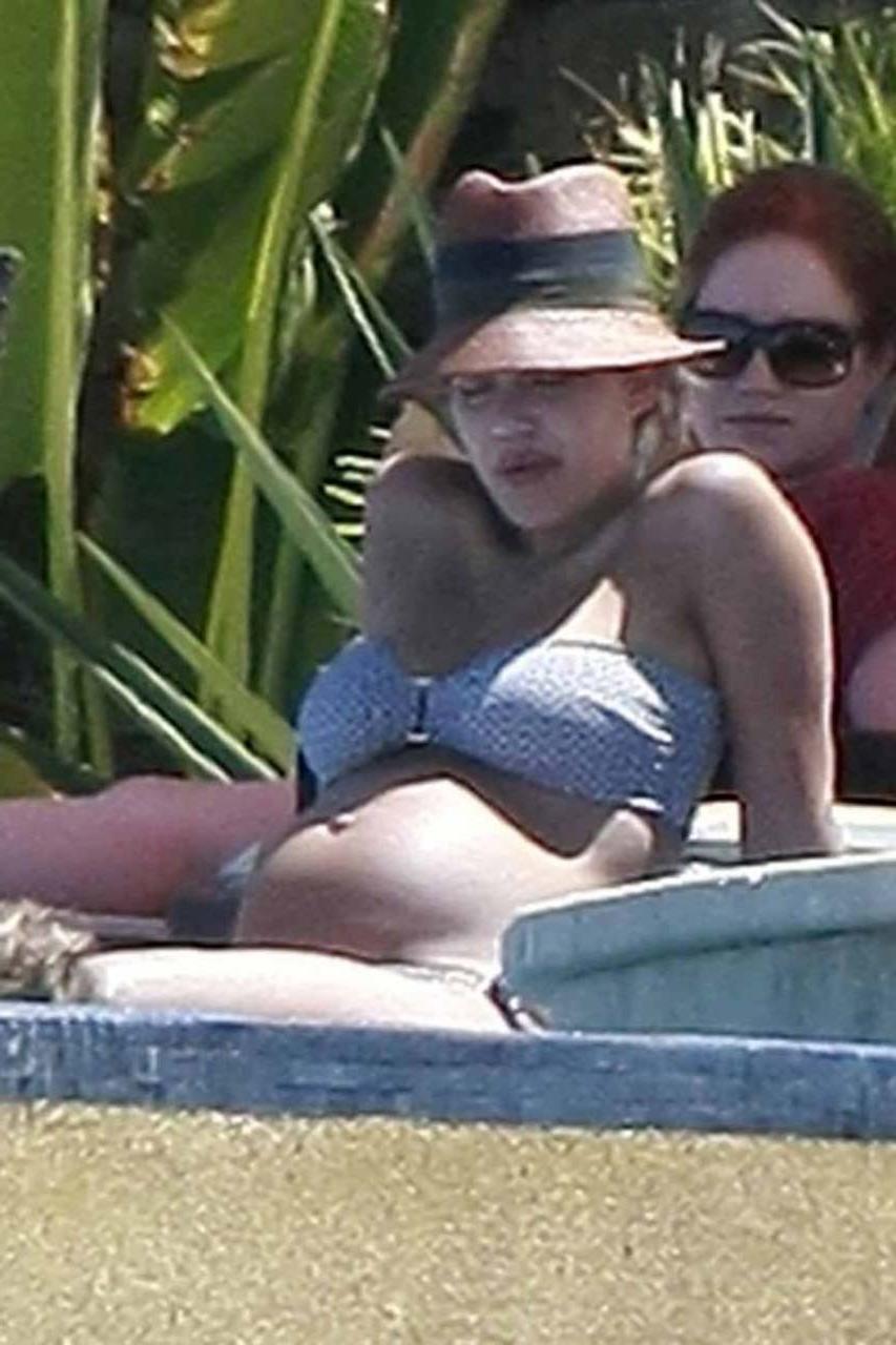 16P Jessica Alba exposing her sexy body and huge boobs in bikini on pool