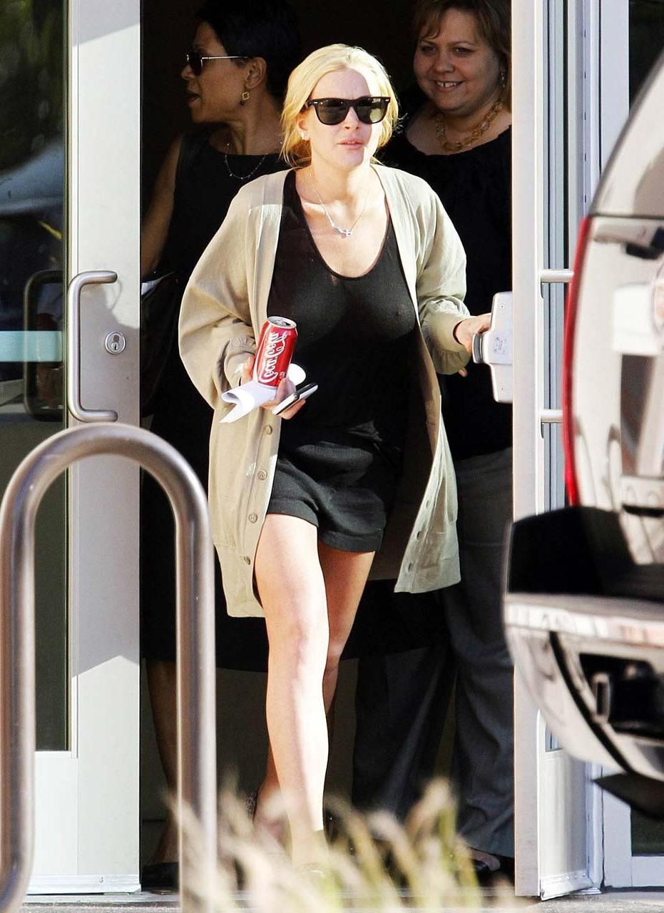 16P Lindsay Lohan showing her nice big boobs in see thru top paparazzi pictures