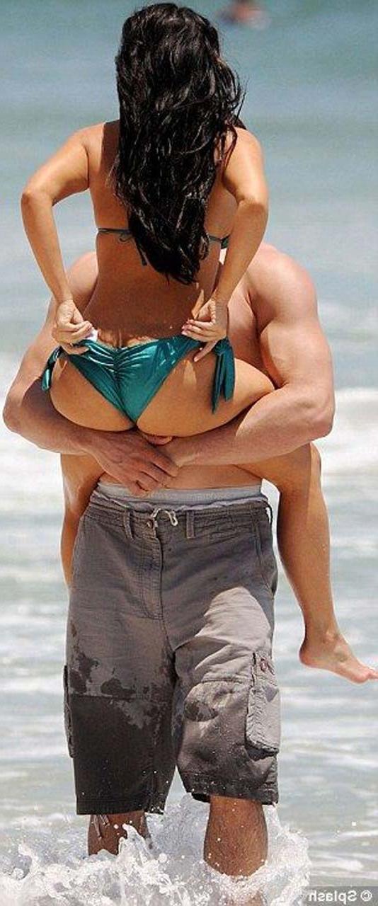 16P Kim Kardashian exposing sexy body and hot ass in bikini on beach