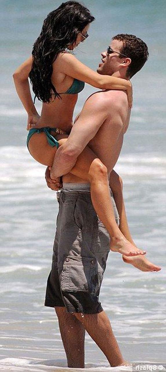 16P Kim Kardashian exposing sexy body and hot ass in bikini on beach