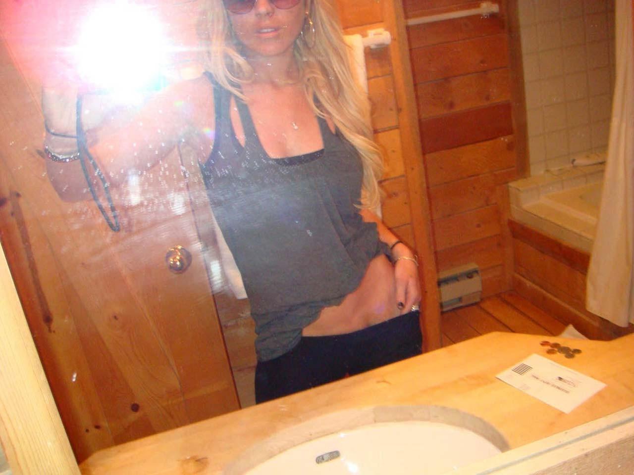 16P Lindsay Lohan posing nude and showing her fucking huge boobs