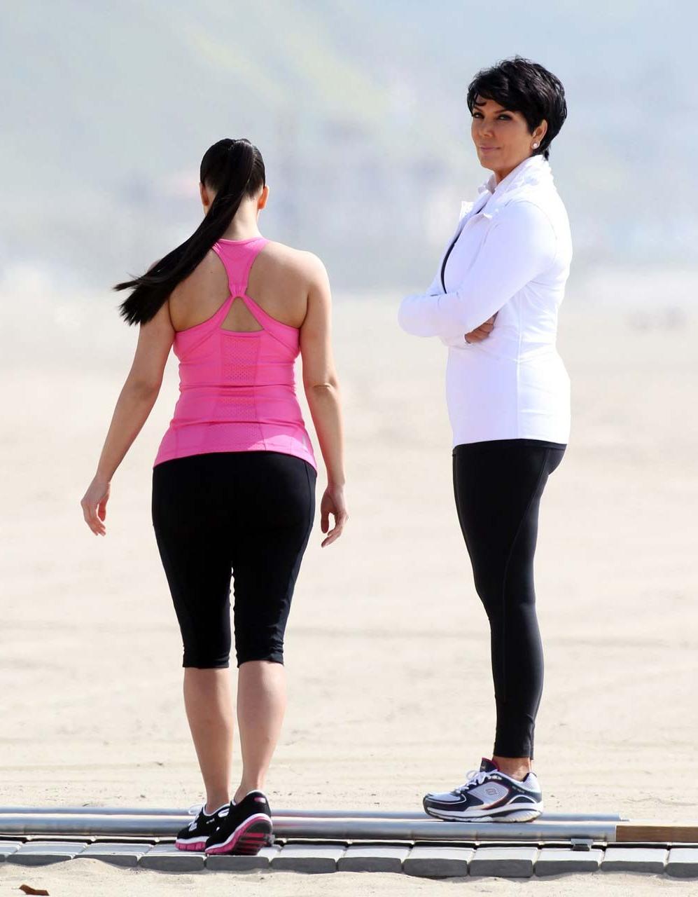 16P Kim Kardashian exposing her sexy body and huge boobs while exerciseing