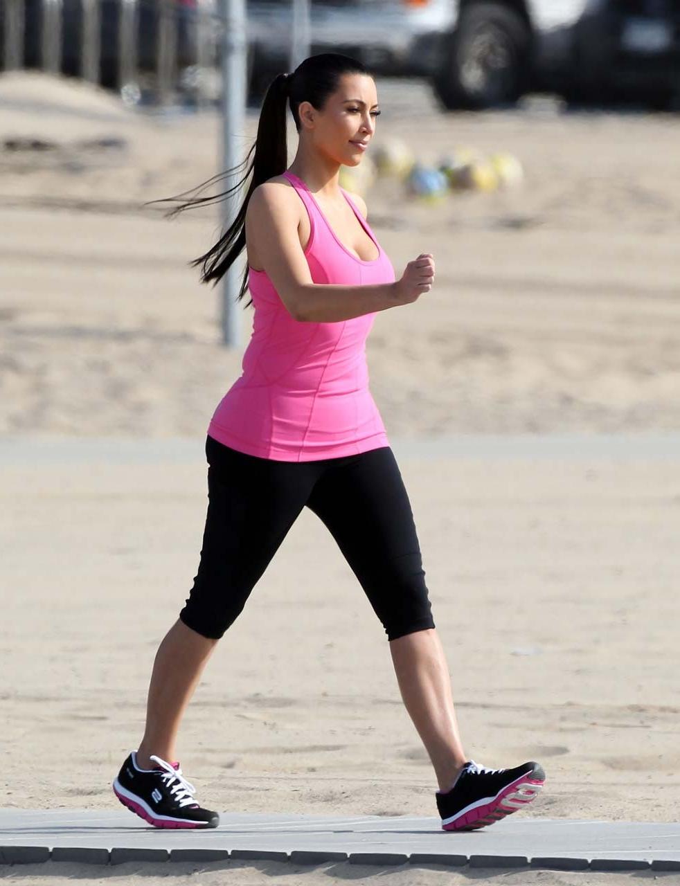 16P Kim Kardashian exposing her sexy body and huge boobs while exerciseing