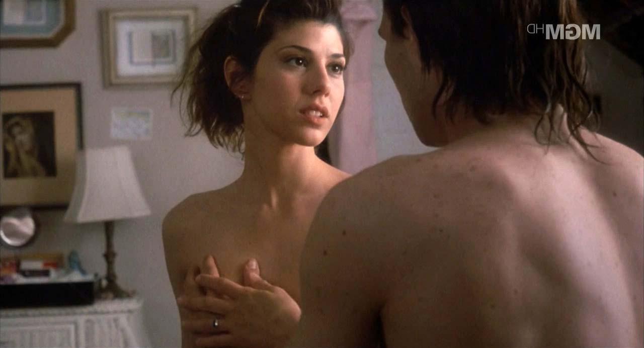 16P Marisa Tomei exposing her nice big boobs and upskirt paparazzi pictures
