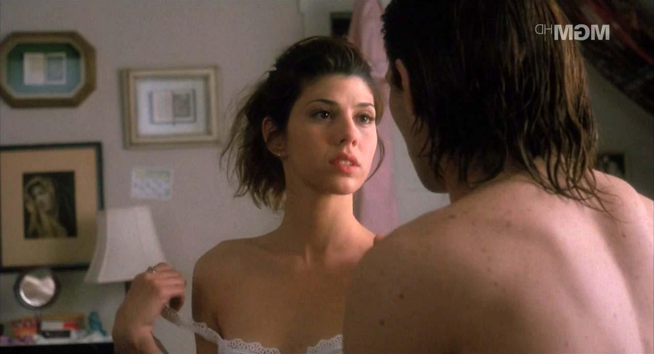 16P Marisa Tomei exposing her nice big boobs and upskirt paparazzi pictures