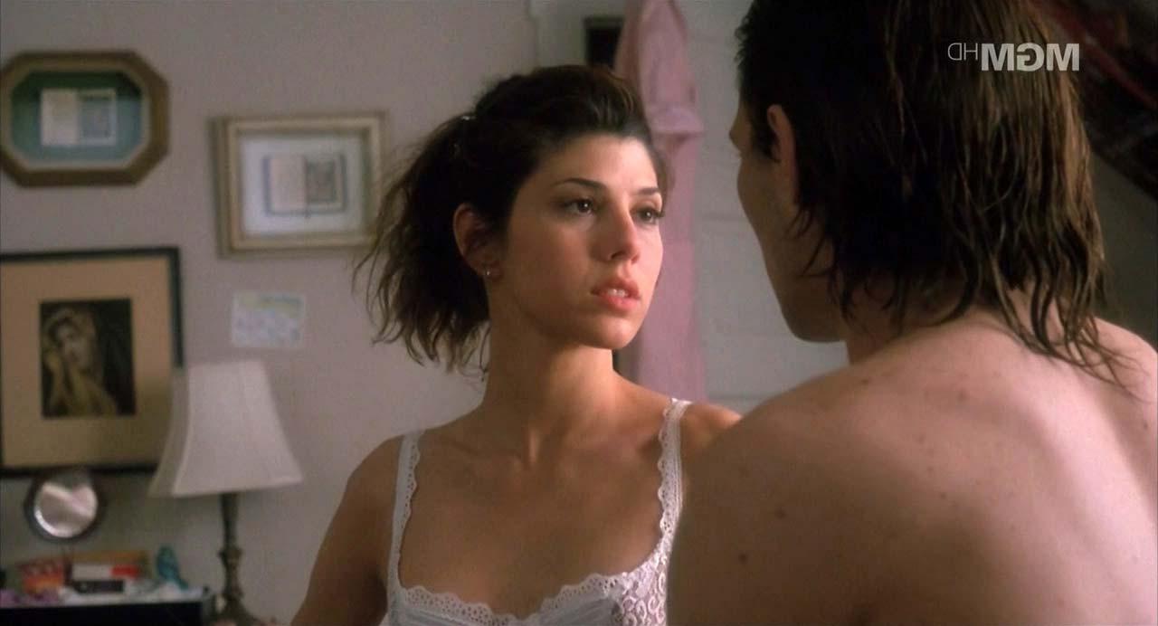16P Marisa Tomei exposing her nice big boobs and upskirt paparazzi pictures