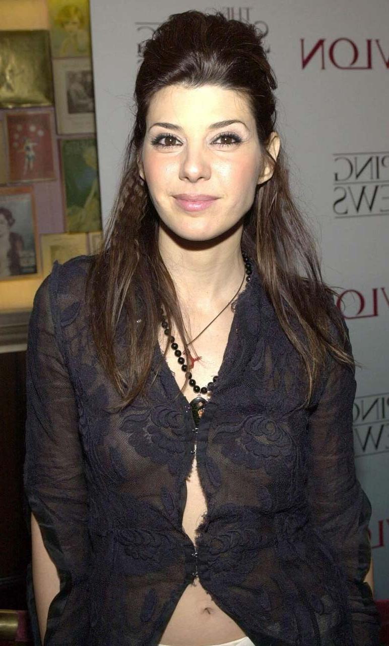 16P Marisa Tomei exposing her nice big boobs and upskirt paparazzi pictures