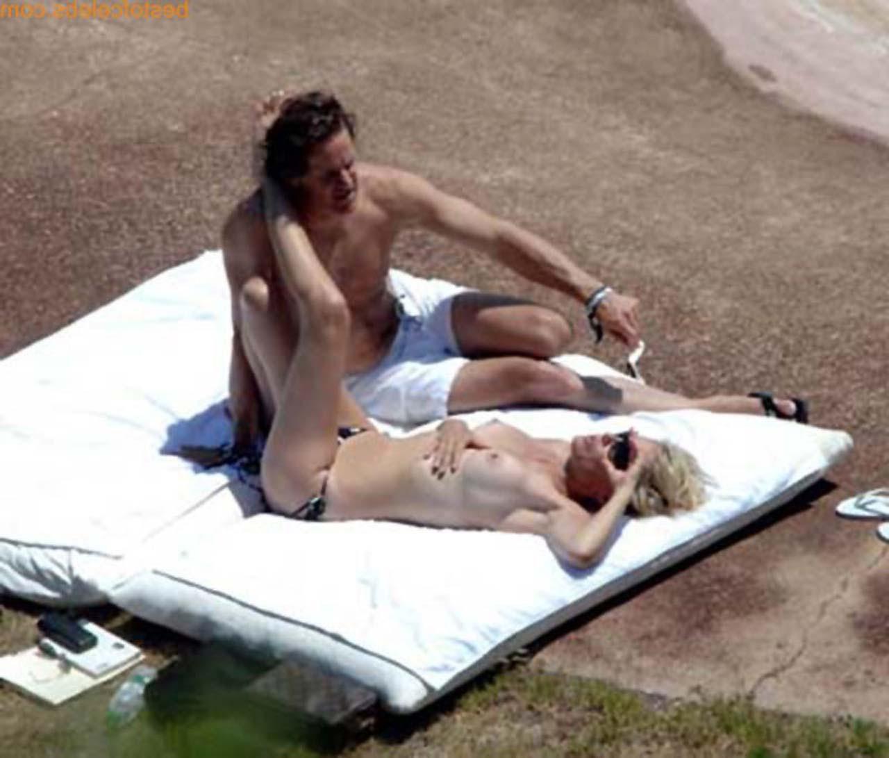 16P Sharon Stone enjoying in topless on beach and exposing sexy ass in bikini