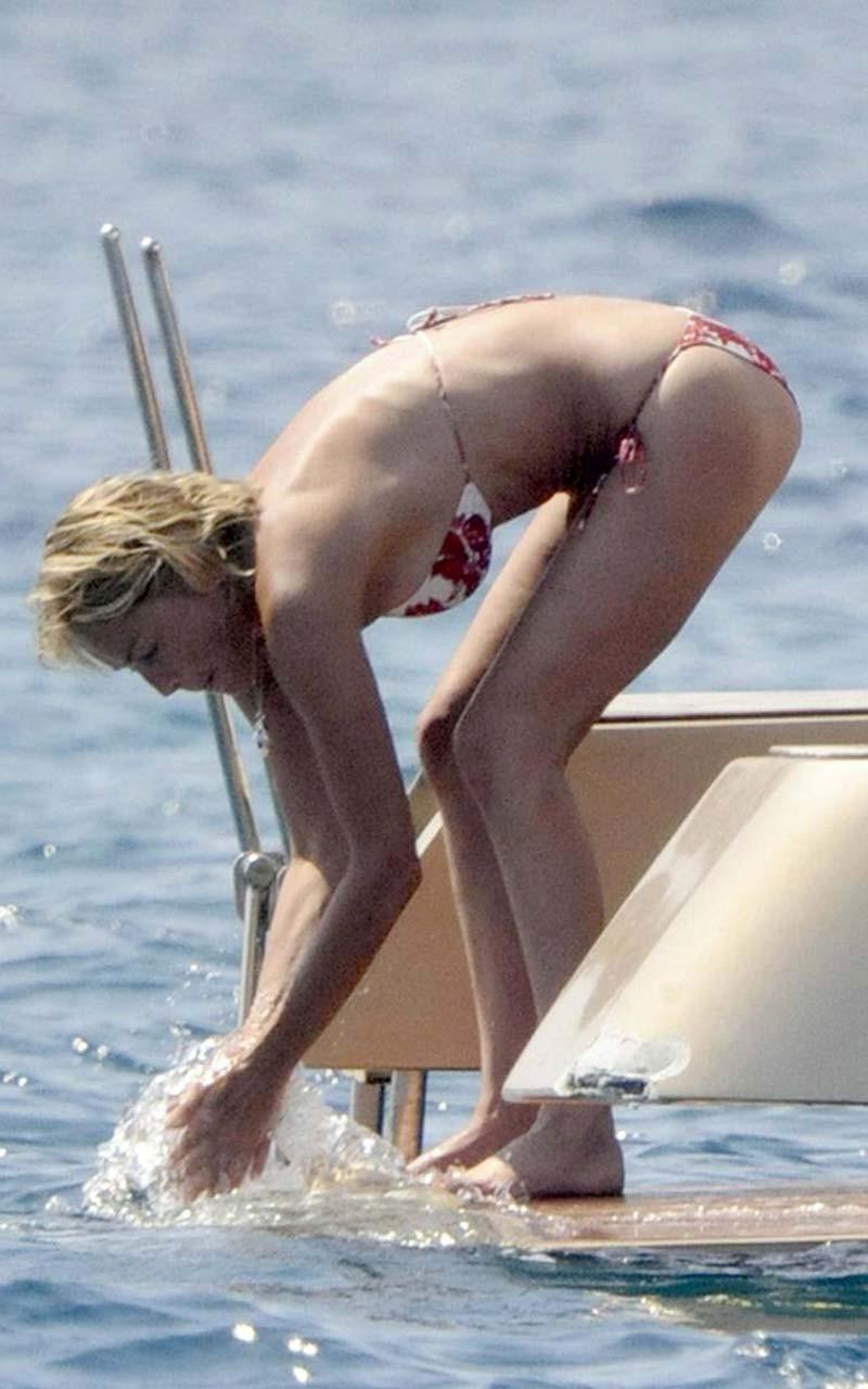 16P Sharon Stone enjoying in topless on beach and exposing sexy ass in bikini