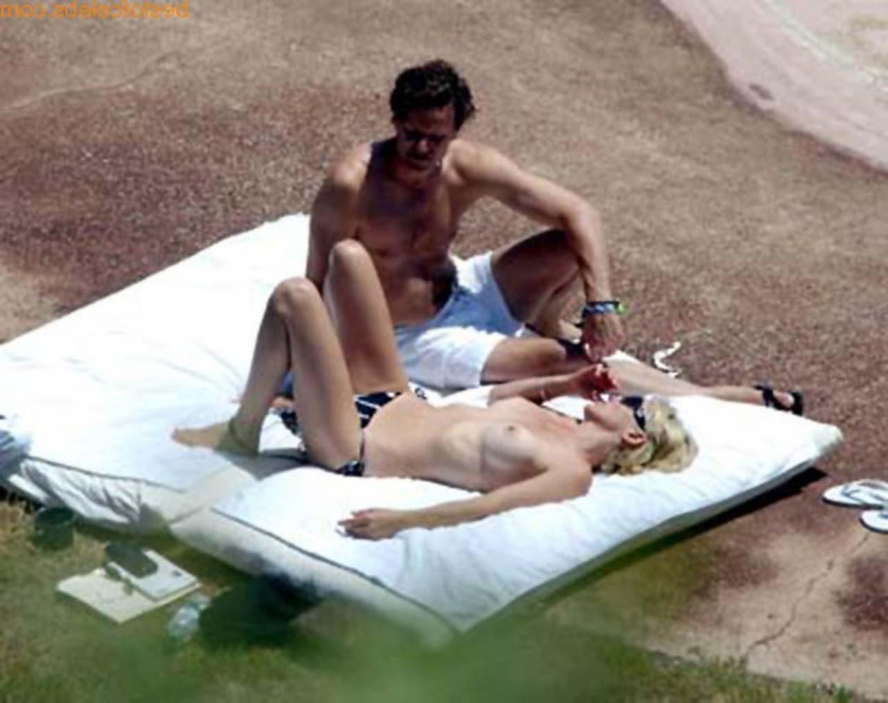 16P Sharon Stone enjoying in topless on beach and exposing sexy ass in bikini