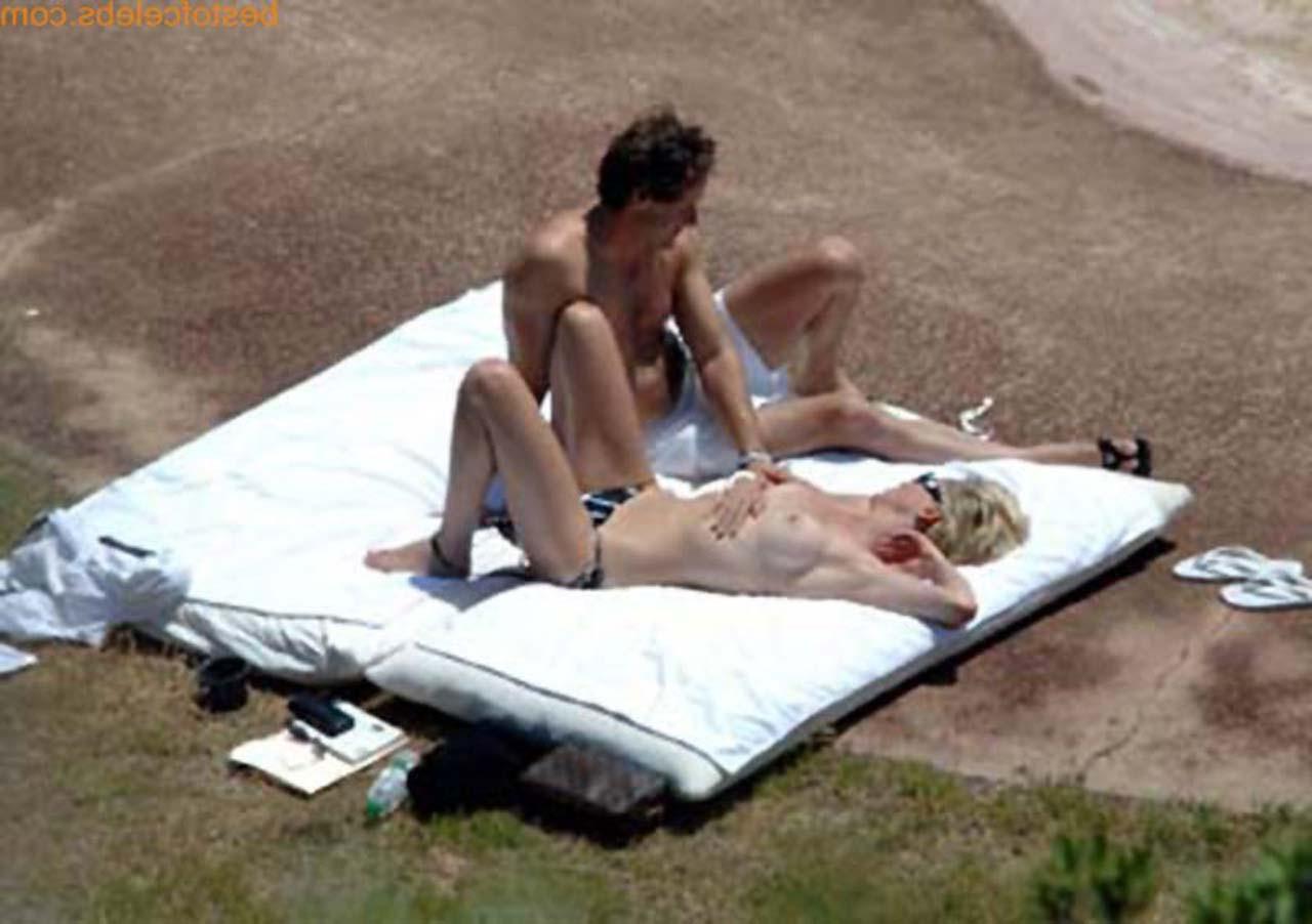 16P Sharon Stone enjoying in topless on beach and exposing sexy ass in bikini