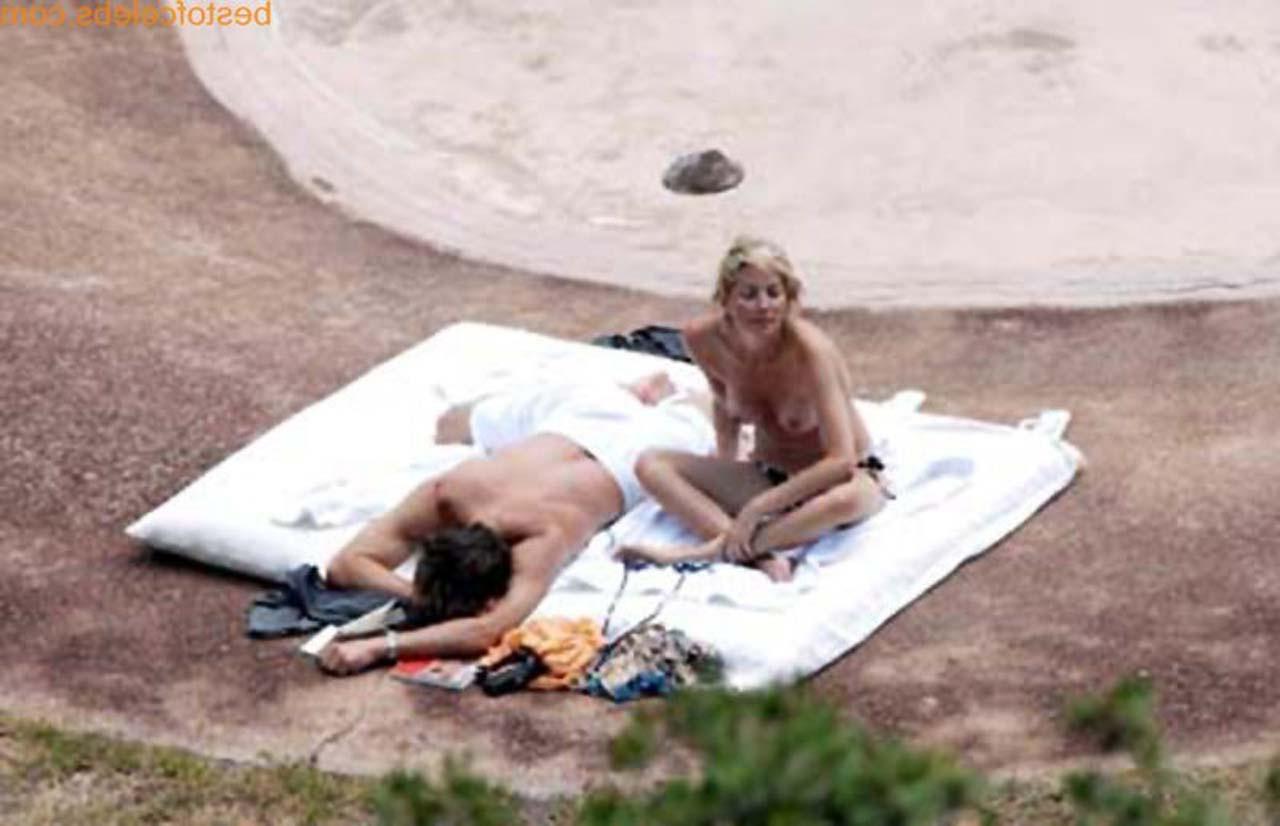 16P Sharon Stone enjoying in topless on beach and exposing sexy ass in bikini