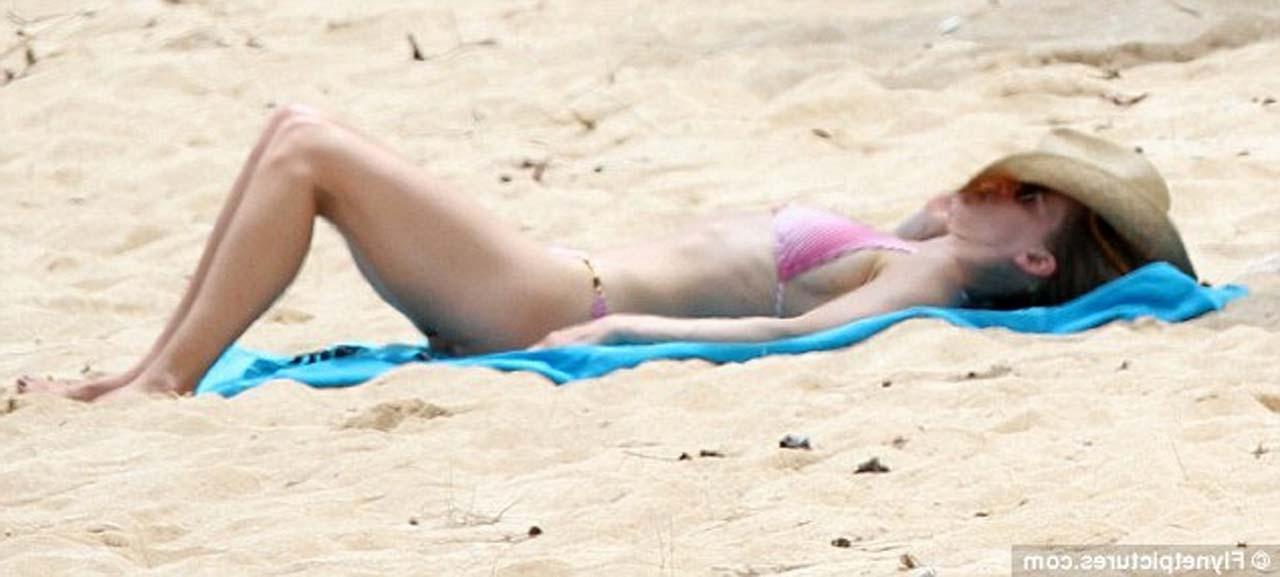 16P Hilary Swank exposing sexy body and hot ass in bikini on beach