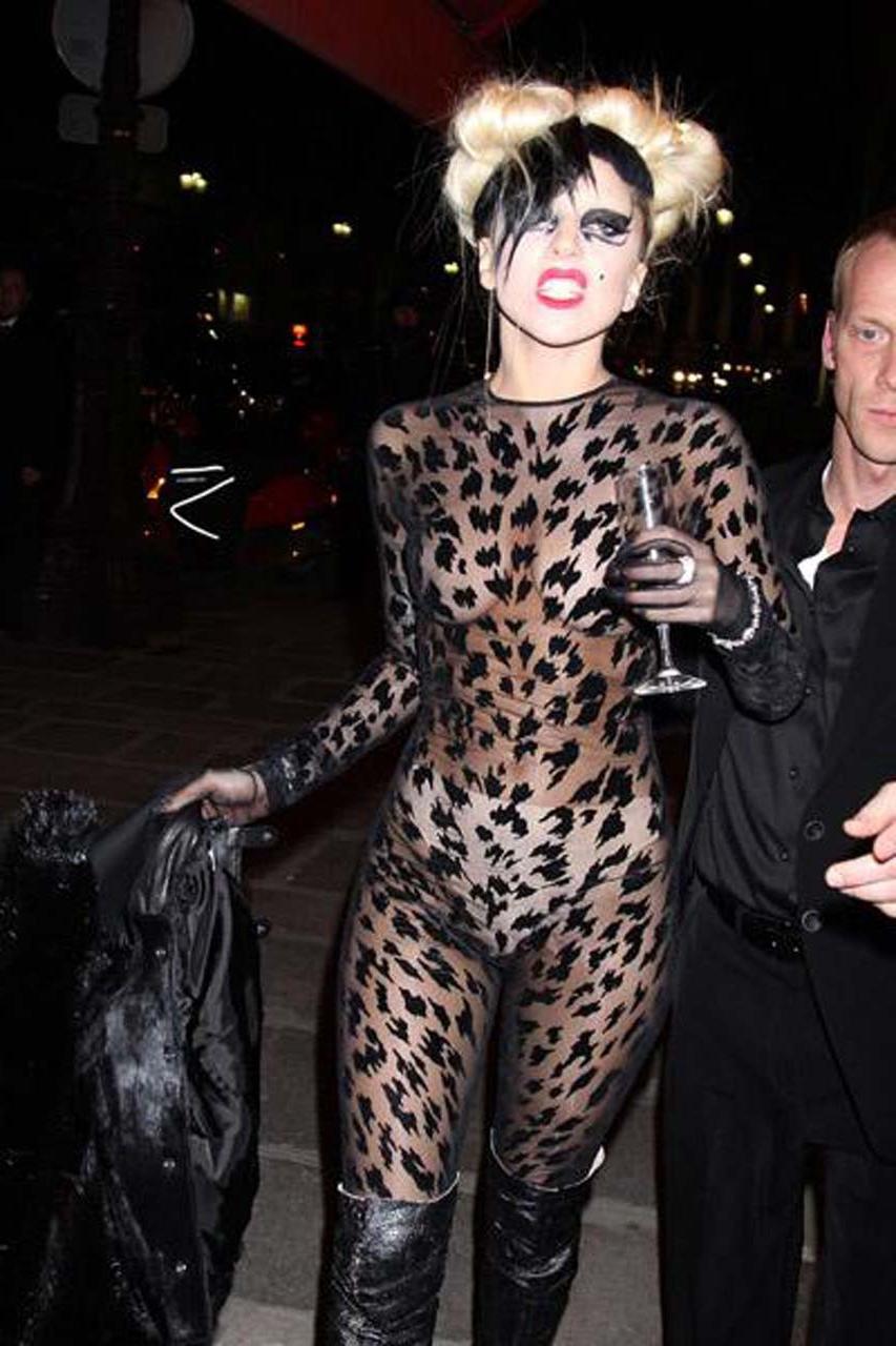 16P Lady Gaga showing panties and her tits in see thru dress paparazzi pictures