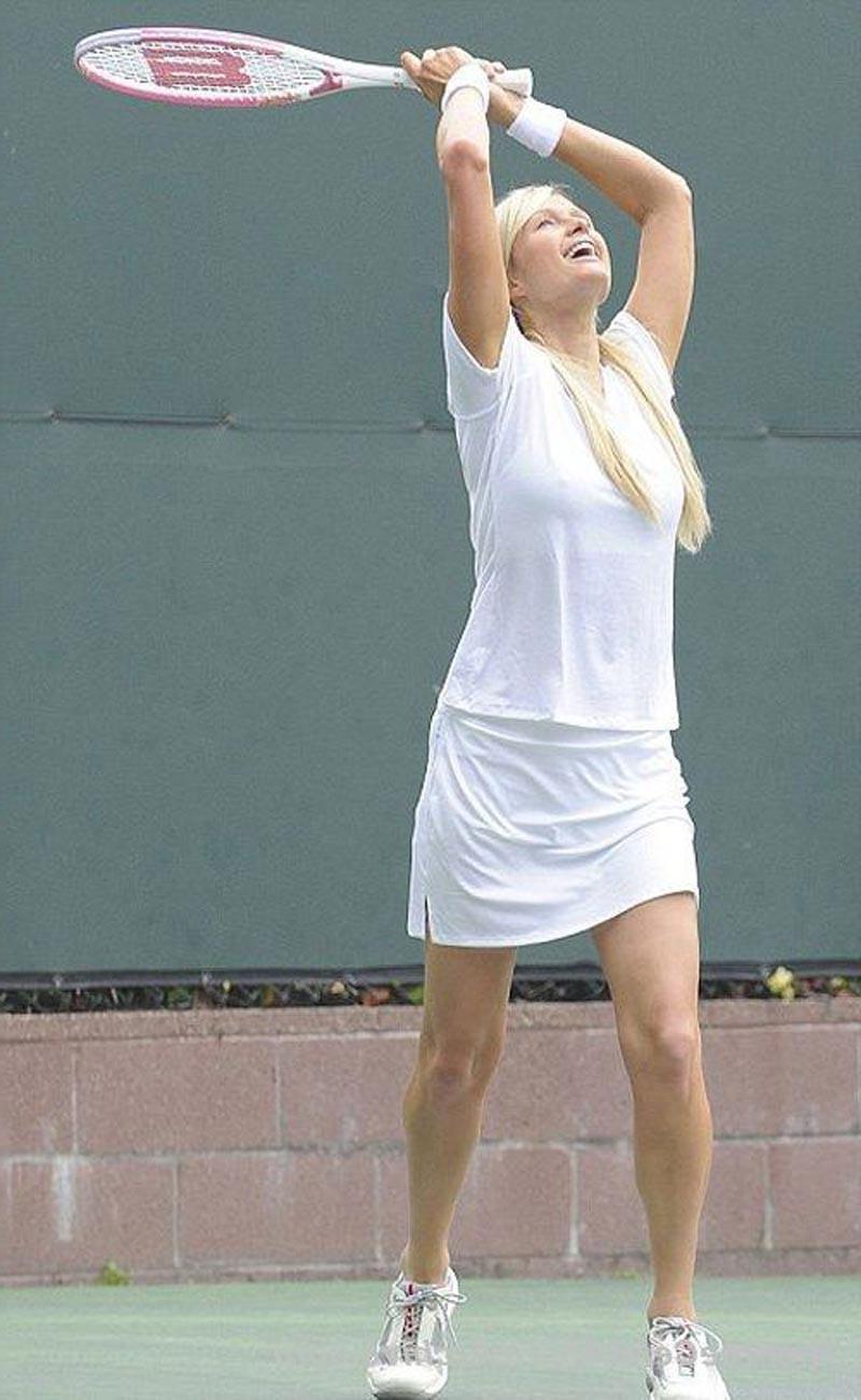 16P Paris Hilton upskirt while playing tennis