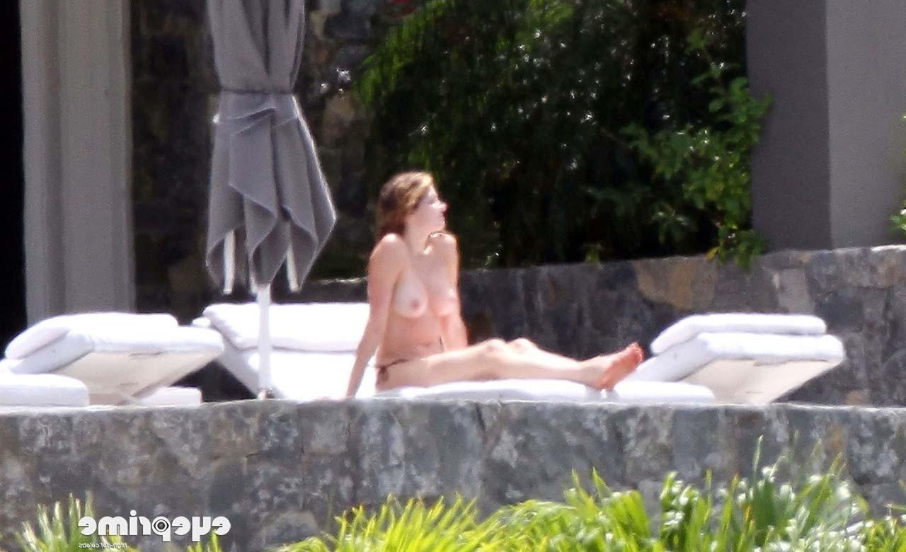 16P Stephanie Seymour exposing her nice big boobs while sunbathing and in yellow see