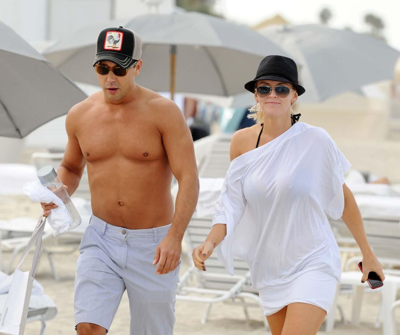 16P Jenny McCarthy sucking banana and looking sexy in black bikini