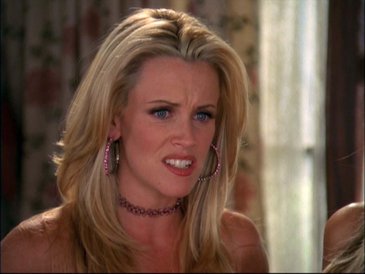 16P Jenny McCarthy sucking banana and looking sexy in black bikini