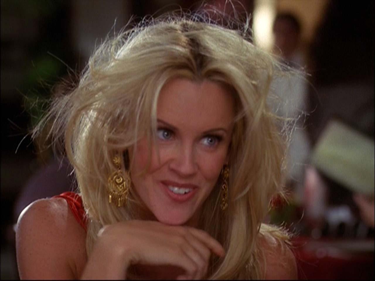 16P Jenny McCarthy sucking banana and looking sexy in black bikini