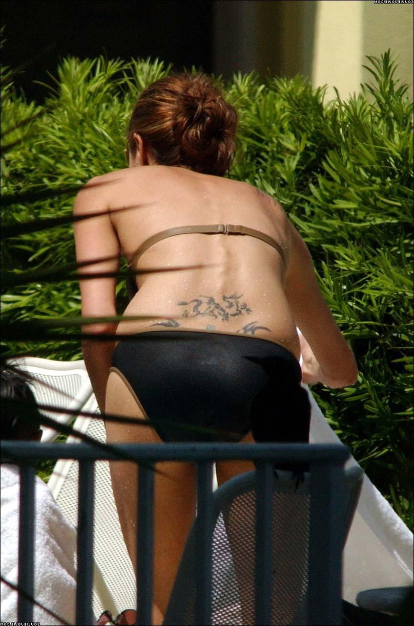 16P Angelina Jolie posing nude and showing her sexy boobs