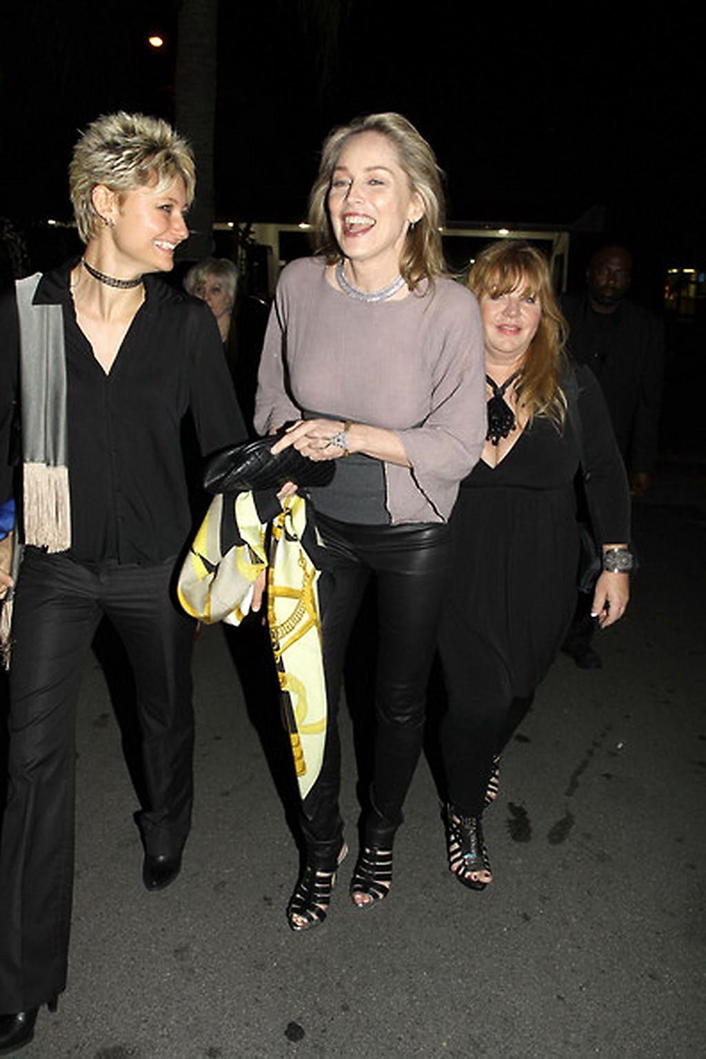16P Sharon Stone shows off her boobs wearing see through top out in Brentwood