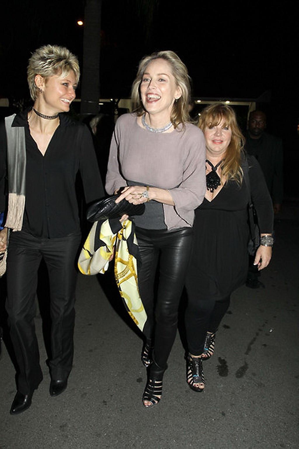 16P Sharon Stone shows off her boobs wearing see through top out in Brentwood