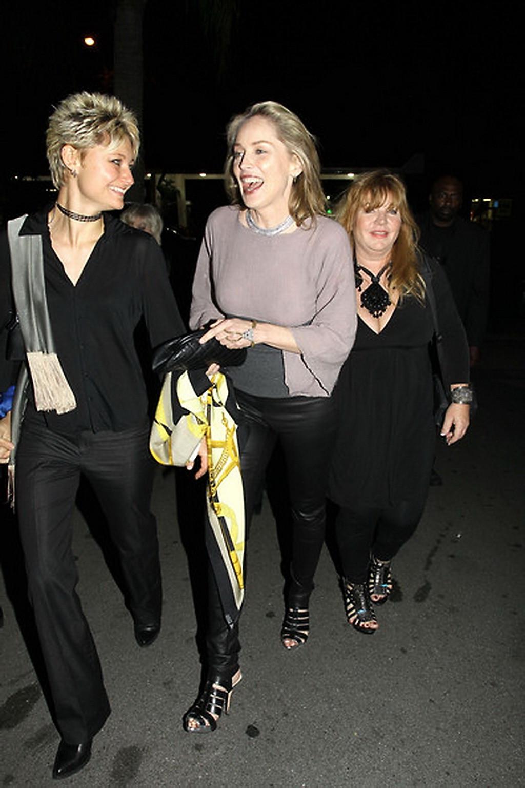 16P Sharon Stone shows off her boobs wearing see through top out in Brentwood