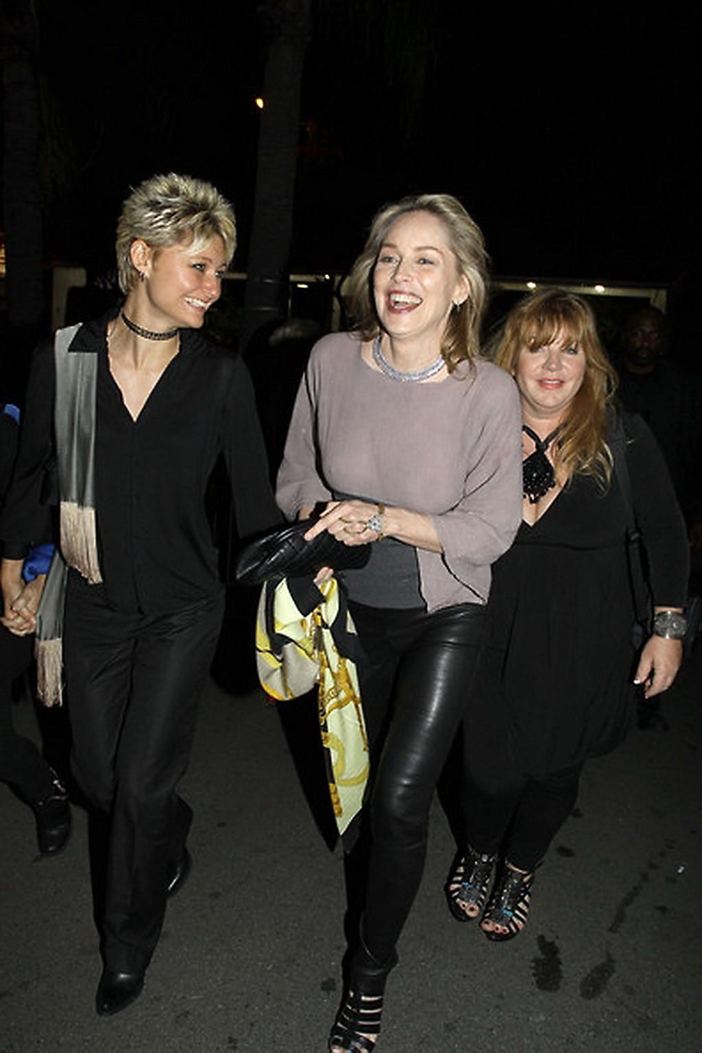 16P Sharon Stone shows off her boobs wearing see through top out in Brentwood
