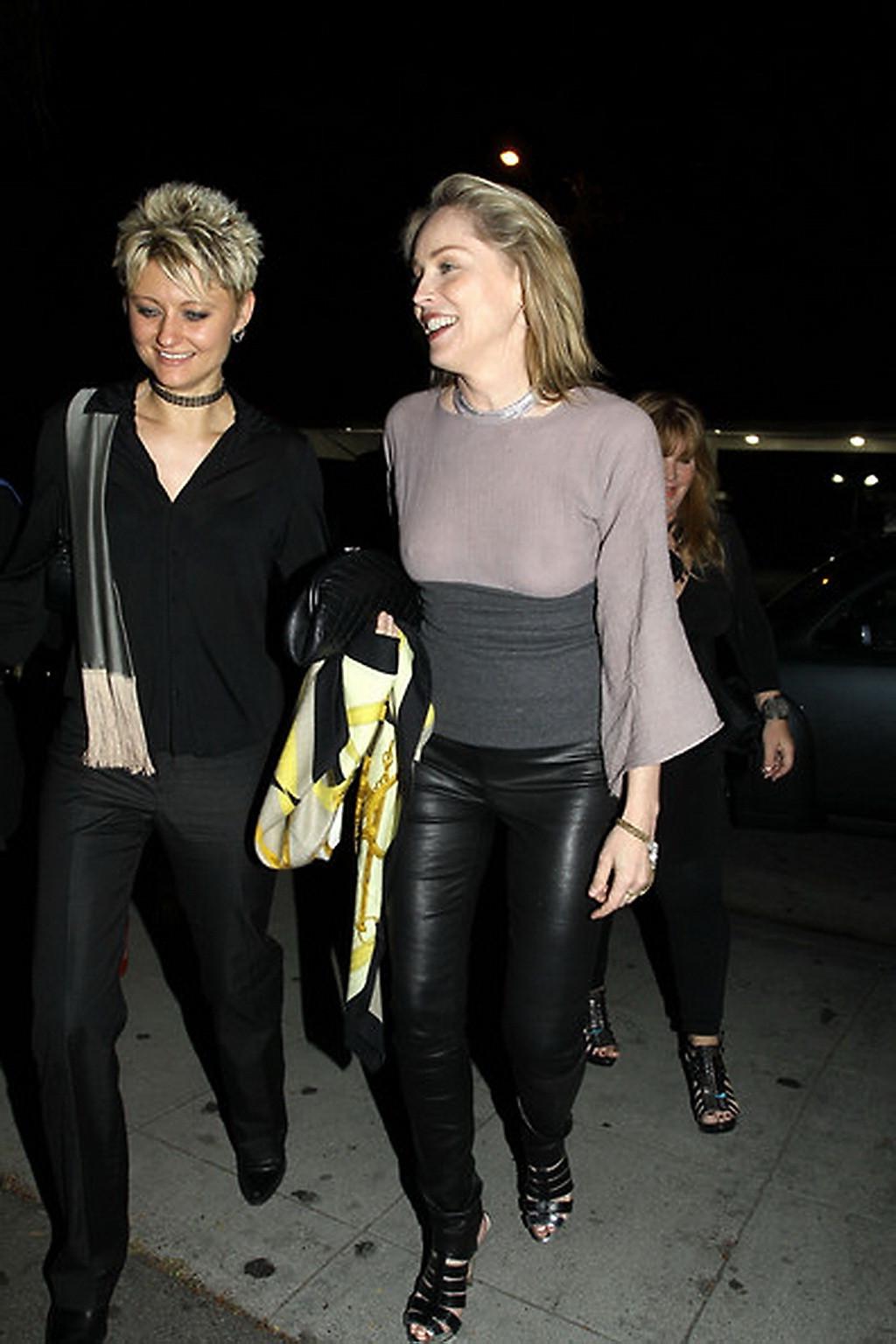 16P Sharon Stone shows off her boobs wearing see through top out in Brentwood