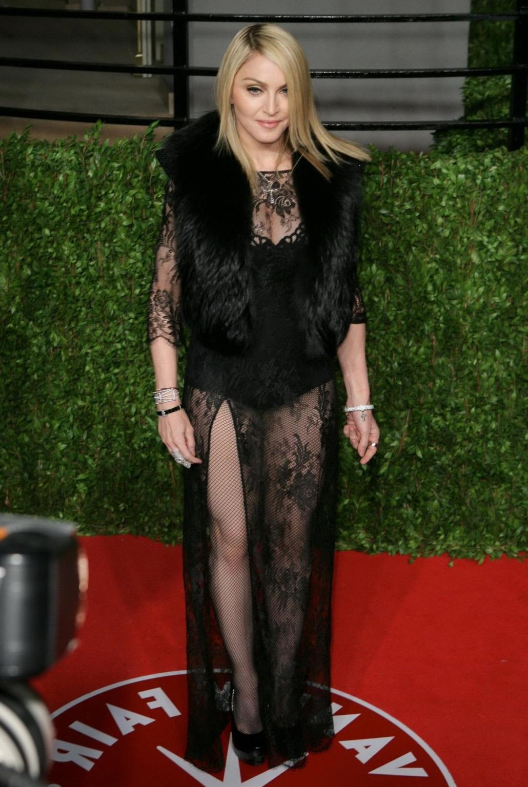 16P Madonna wearing black lace  fishnets at the Vanity Fair Oscar Party
