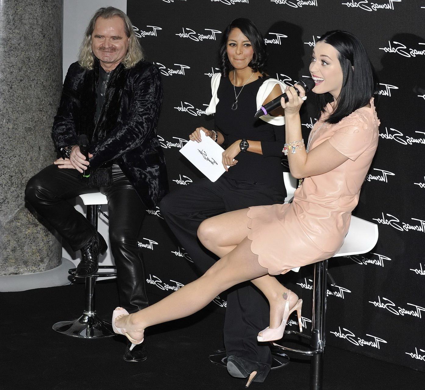 16P Katy Perry leggy wearing skin colored latex dress at Thomas Sabo Press Conferenc