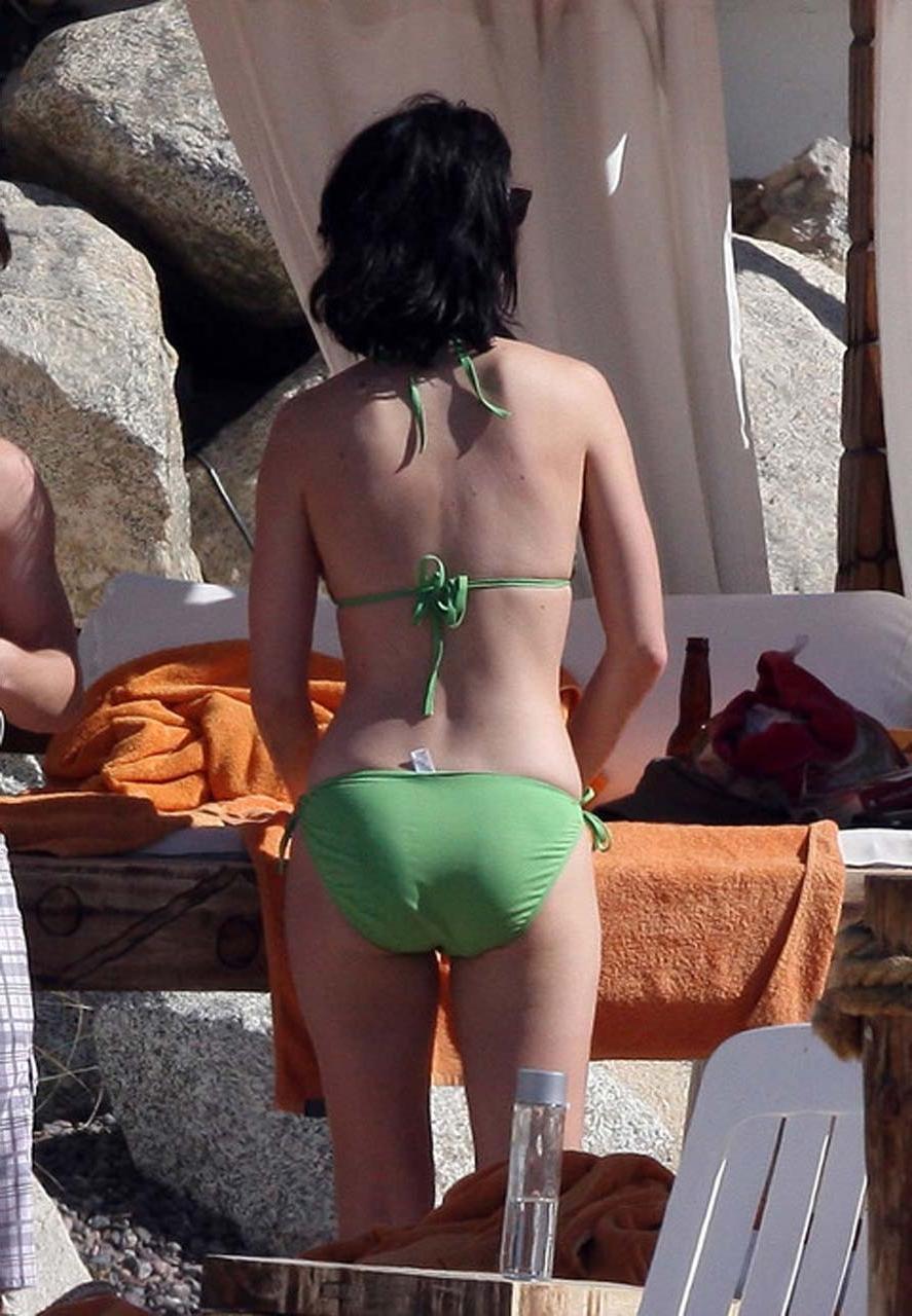 16P Katy Perry exposing her sexy body and huge boobs in green bikini