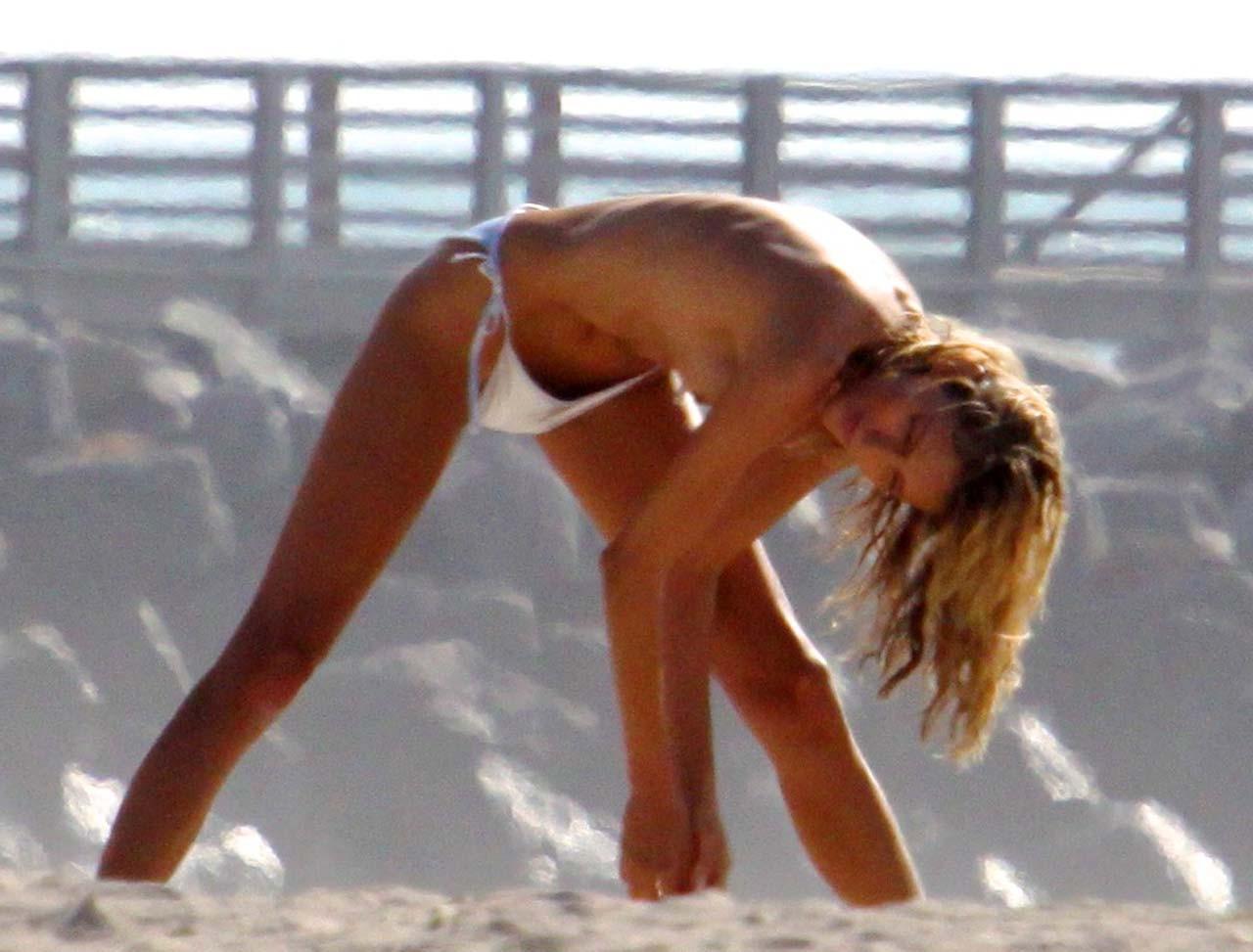 10P Anja Rubik showing her nice tits on photoshoot paparazzi pictures and on stage