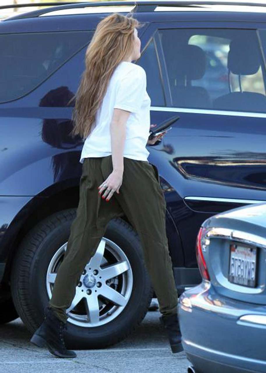 16P Miley Cyrus showing her sexy ass and hard nipples in see thru shirt