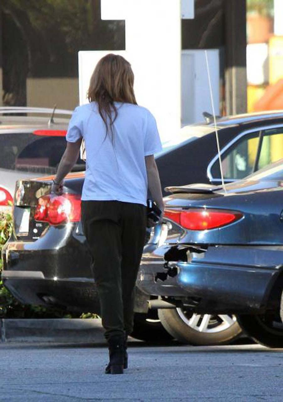 16P Miley Cyrus showing her sexy ass and hard nipples in see thru shirt