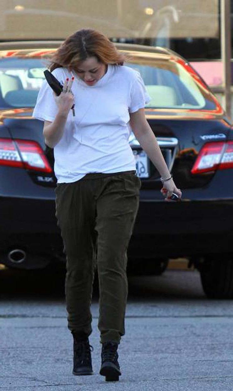 16P Miley Cyrus showing her sexy ass and hard nipples in see thru shirt