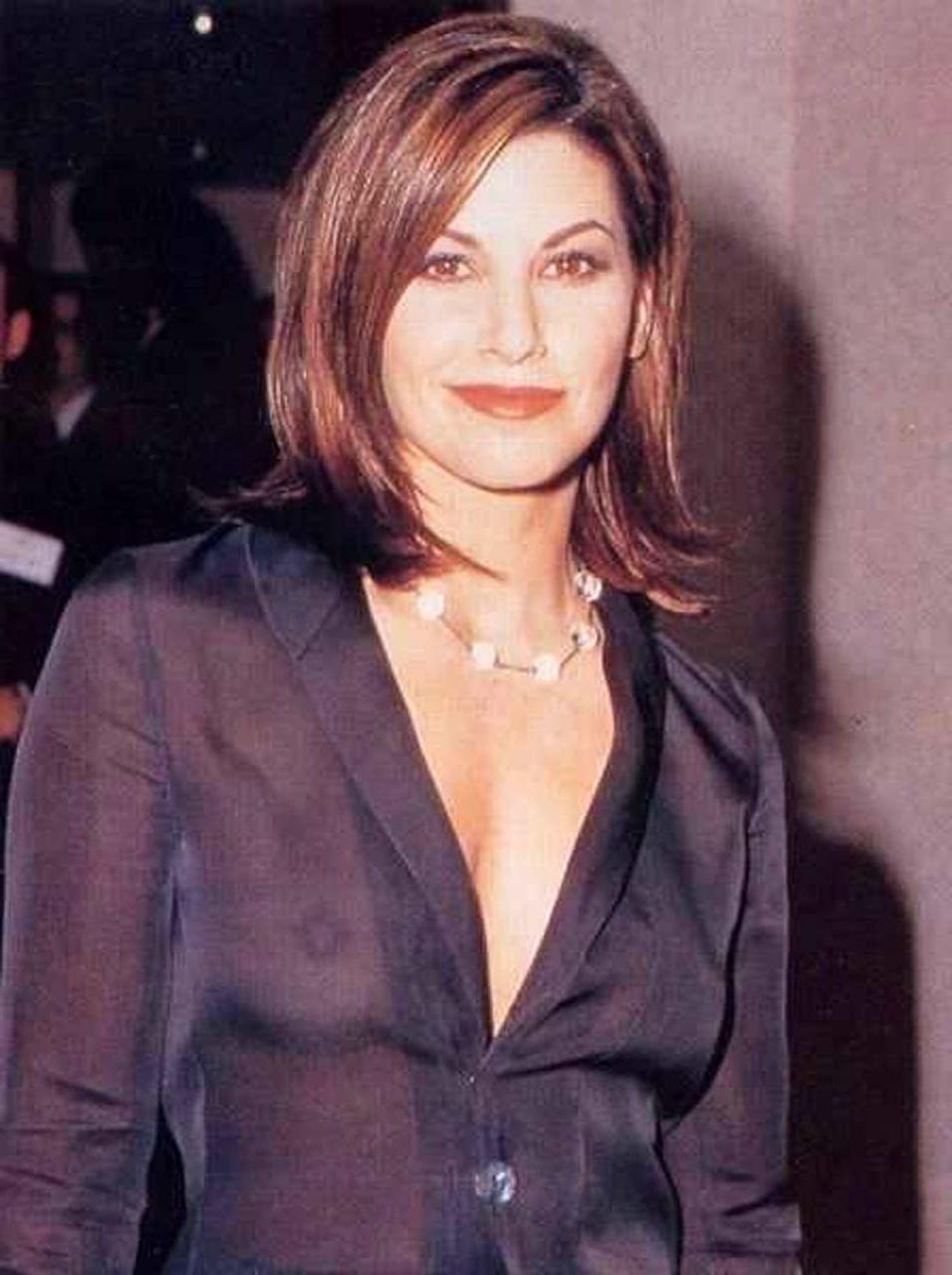 10P Gina Gershon exposing her nice big tits in see thru dress paparazzi pictures