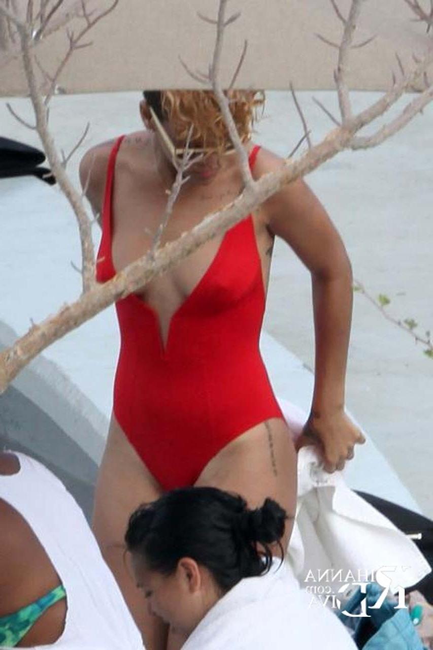 16P Rihanna exposing her fucking sexy body and sexy tits in see thru shirt