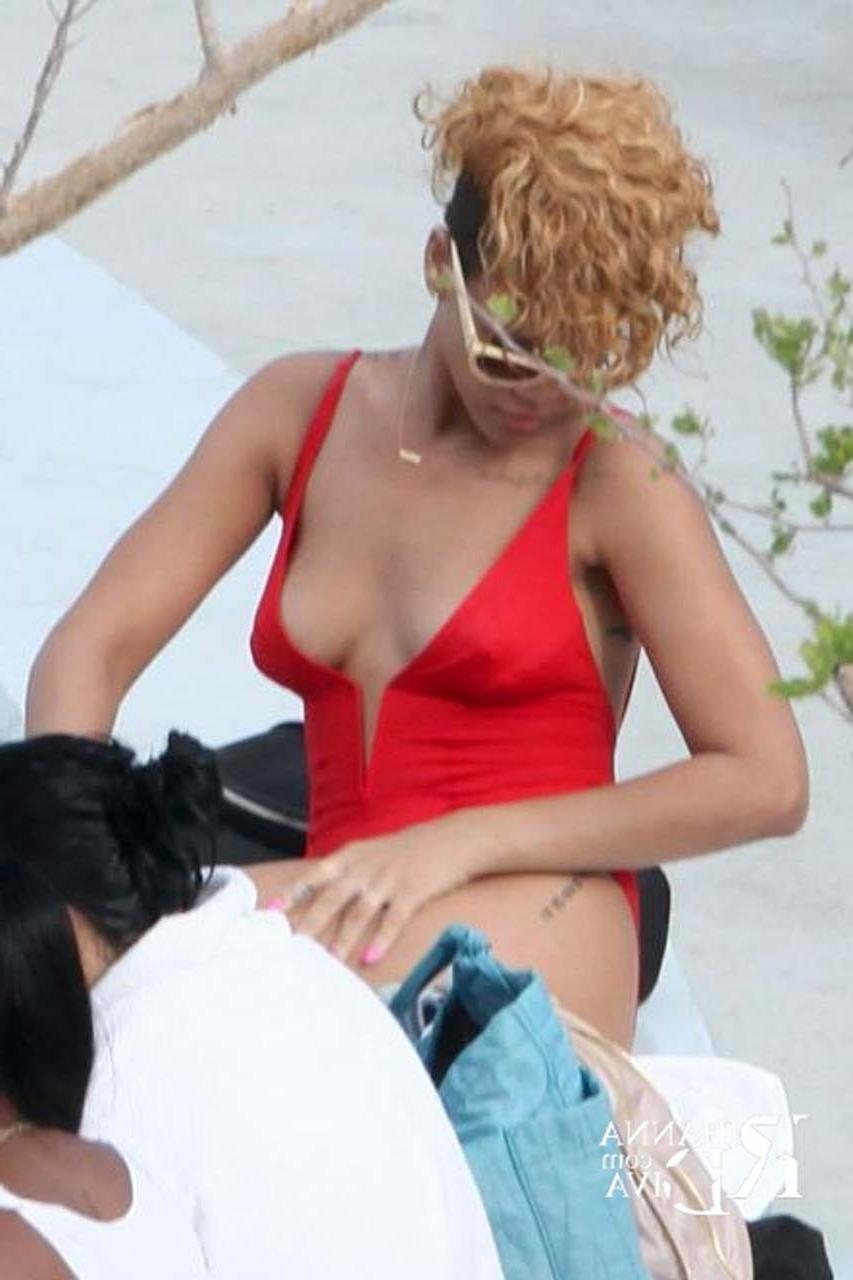 16P Rihanna exposing her fucking sexy body and sexy tits in see thru shirt