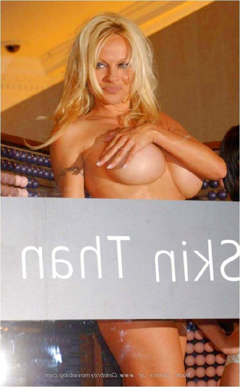16P Pamela Anderson posing nude and showing her sexy huge boobs